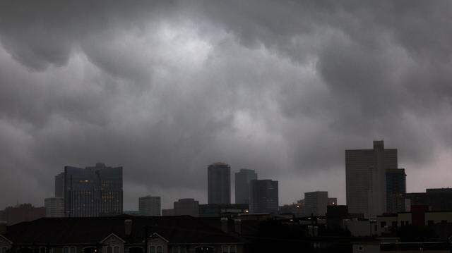 Storm clouds drop rain on downtown Fort Worth on Wednesday, April 30, 2025.