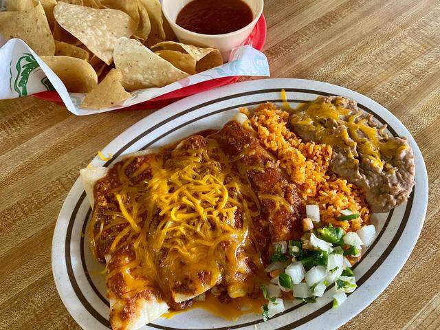 An enchilada platter is $6 with a drink on the Monday special at Day Break Cafe.