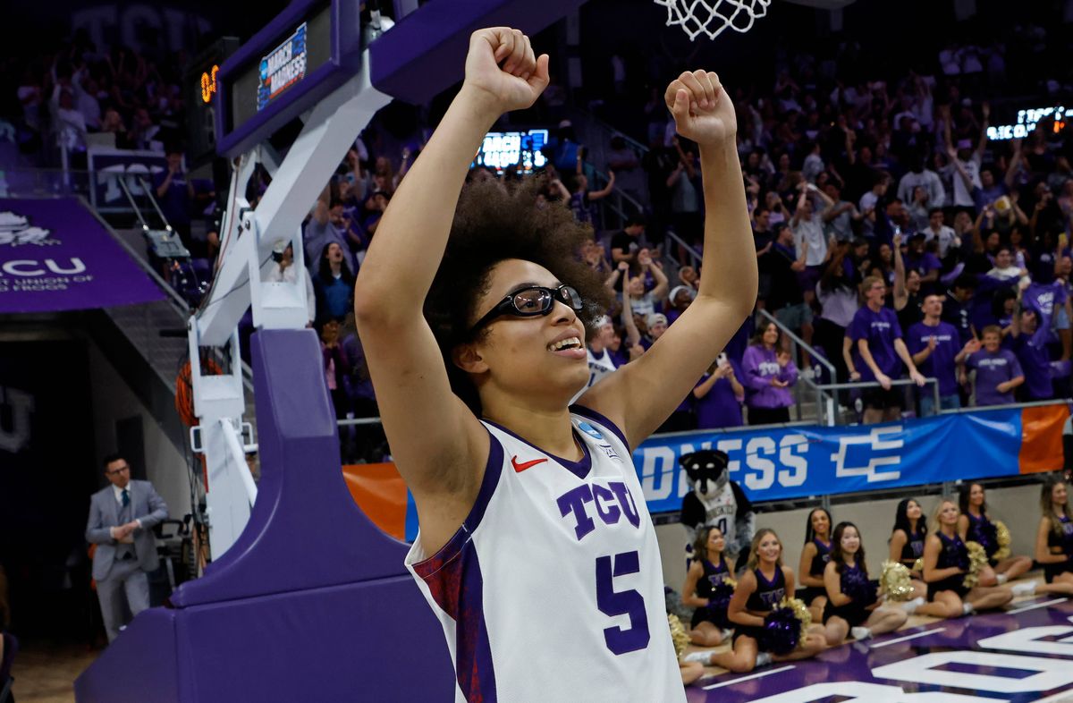 Olivia Miles #5 of the TCU Horned Frogs celebrates following the overtime victory over the Washington Huskies in the Second Round of the NCAA Women's Basketball Tournament on March 22, 2026 at Schollmaier Arena in Fort Worth, Texas