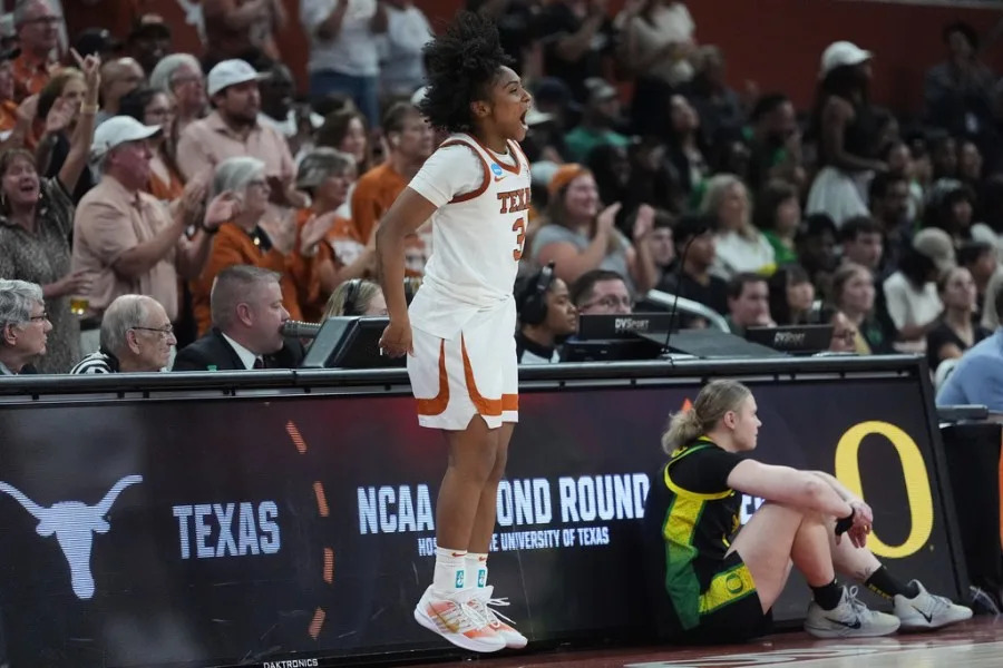 Texas guard Rori Harmon (3) celebrates during the second half in the second round of the NCAA college basketball tournament against Oregon, Sunday, March 22, 2026, in Austin, Texas. (AP Photo/Eric Gay)