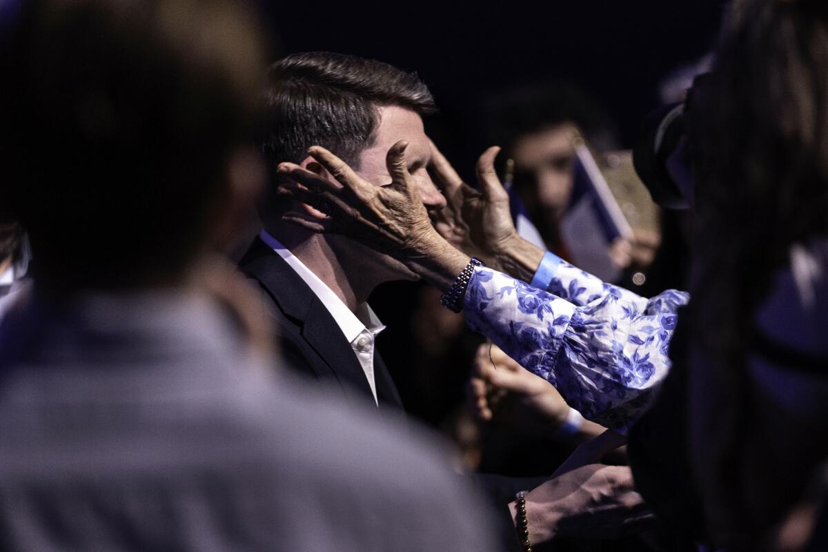 Texas Senate candidate James Talarico is greeted by supporters on election night.