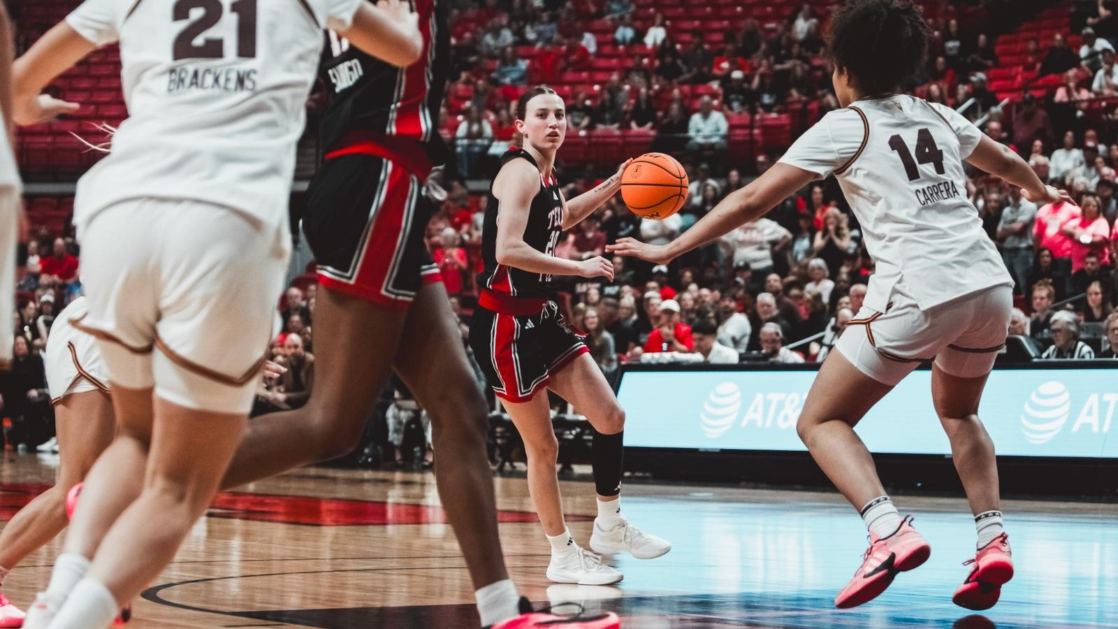 Krista Gerlich celebrating after beating a top-15 team in Baylor.