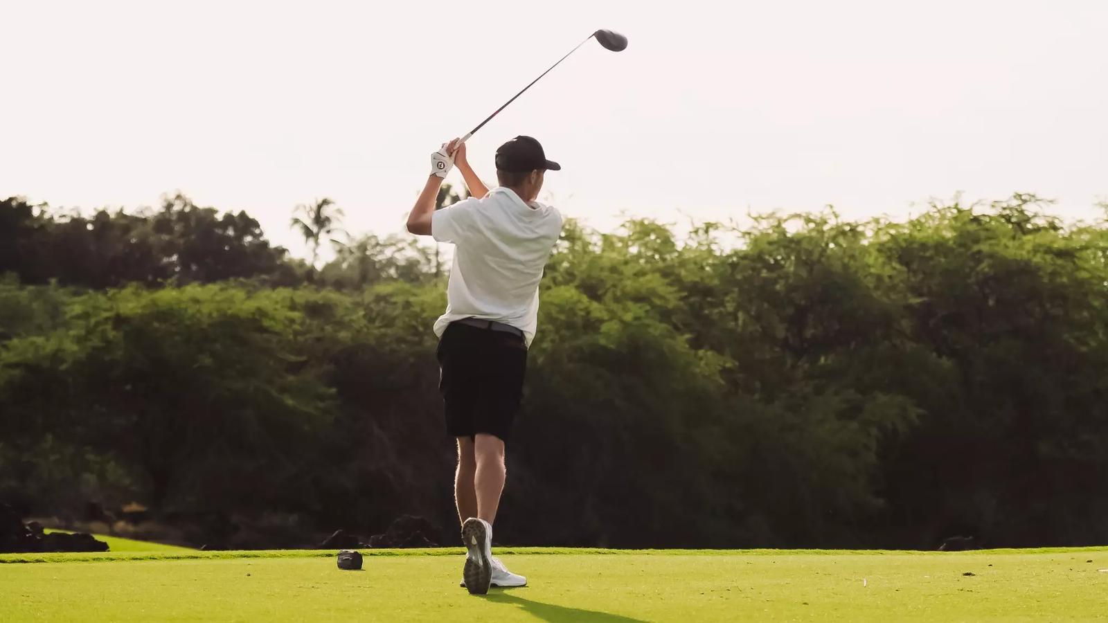 Adam Bresnu hits a practice shot at the Rawls Course