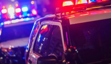 Man dies after being hit, trapped under truck on Arlington highway, officials say