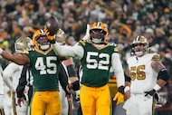 Green Bay Packers defensive end Rashan Gary (52) celebrates a fumble recovery during the...