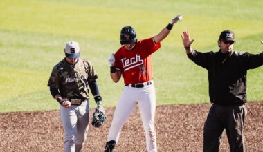 Catcher Matt Quintanar and INF Tracer Lopez pose following the Red Raiders win over Penn State on Saturday, Mar. 7