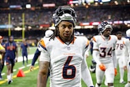 Denver Broncos safety P.J. Locke (6) walks off the field during an NFL preseason football...