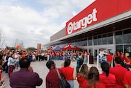 People wait during the opening of a new Target in Oak Cliff in Dallas on March 10, 2026....