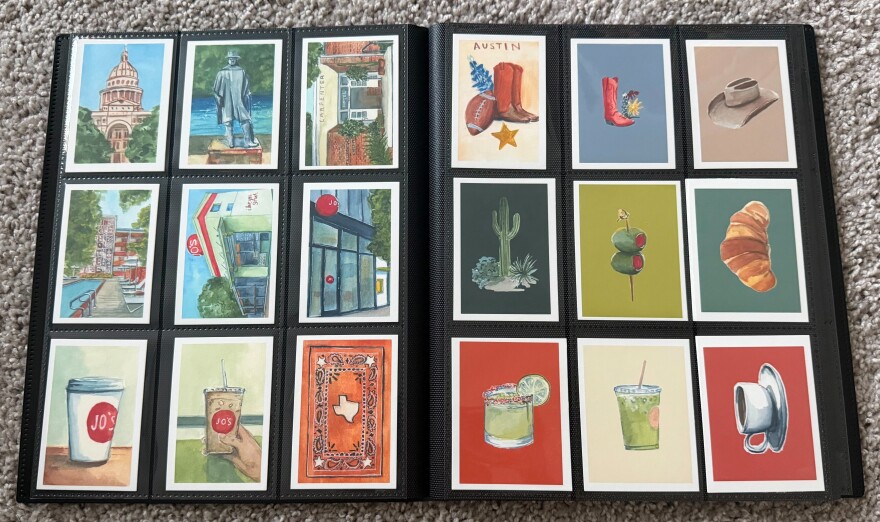 An open binder with pockets that display small pieces of art. The art prints include drawings of coffee cups, a cactus, a cowboy hat, the Capitol building, and more.