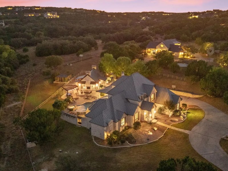 This Boerne mansion for sale comes with horse stalls and luxury air-conditioned dog kennels