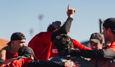 Ttyler Stewart hitting a serve.