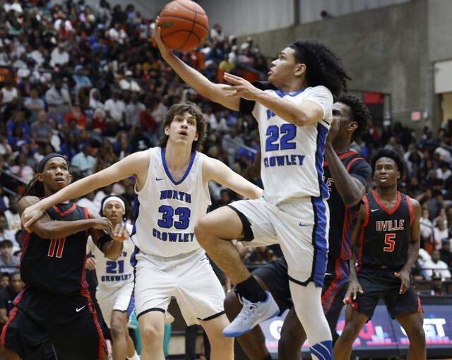 North Crowley guard Isaak Hayes (22) puts one in against Duncanville during the first half of a UIL Class 6A Division I boys semifinal basketball game at Wilkerson Greines Activity Center in Fort Worth, Texas, Tuesday, March 10, 2026.