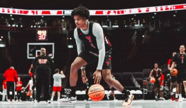 LeJuan Watts looks for room to work against the Iowa State defense.