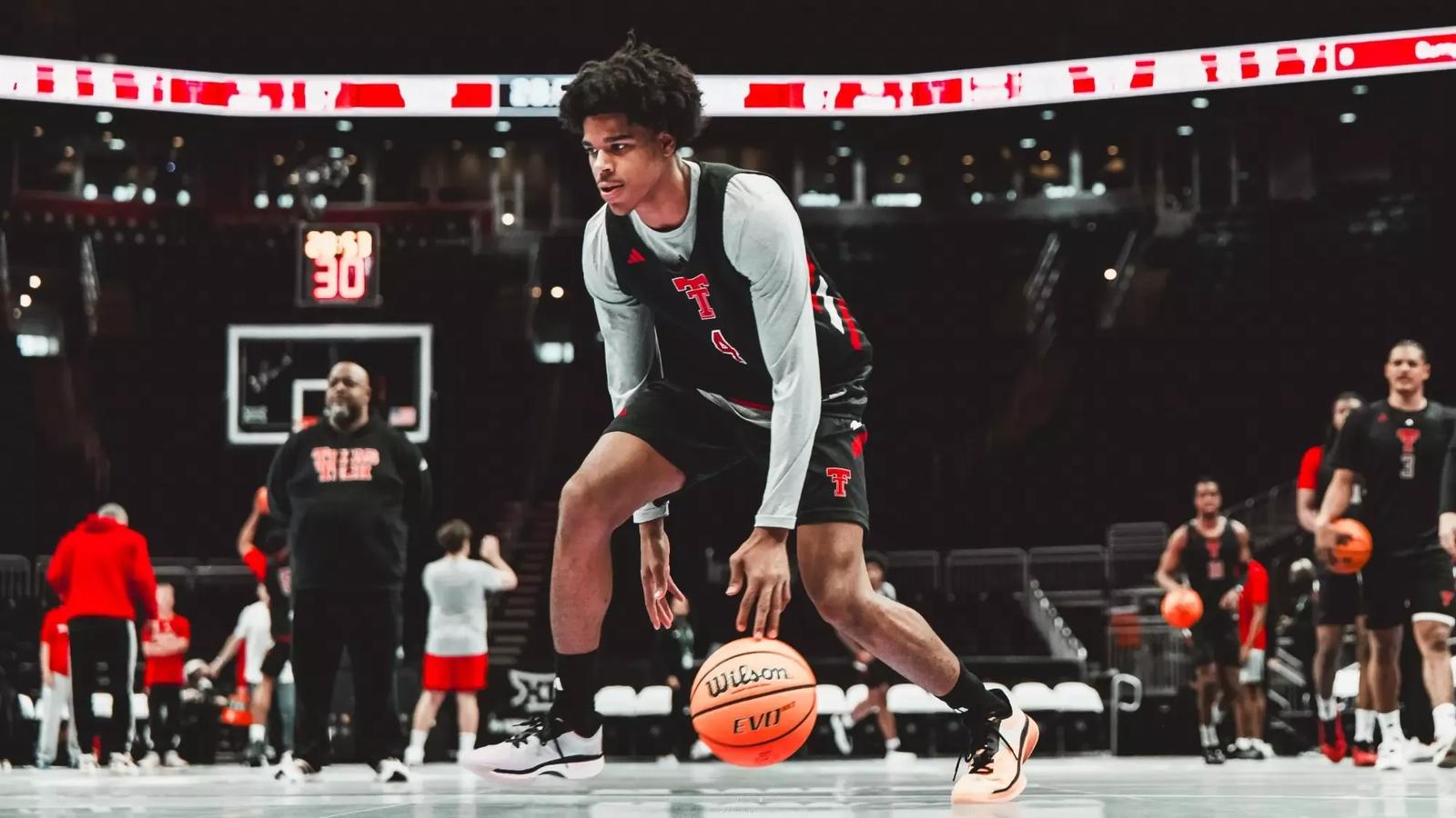 LeJuan Watts looks for room to work against the Iowa State defense.