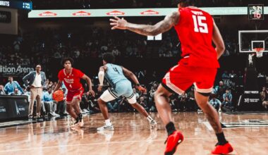 LeJuan Watts looks for room to work against the Iowa State defense.