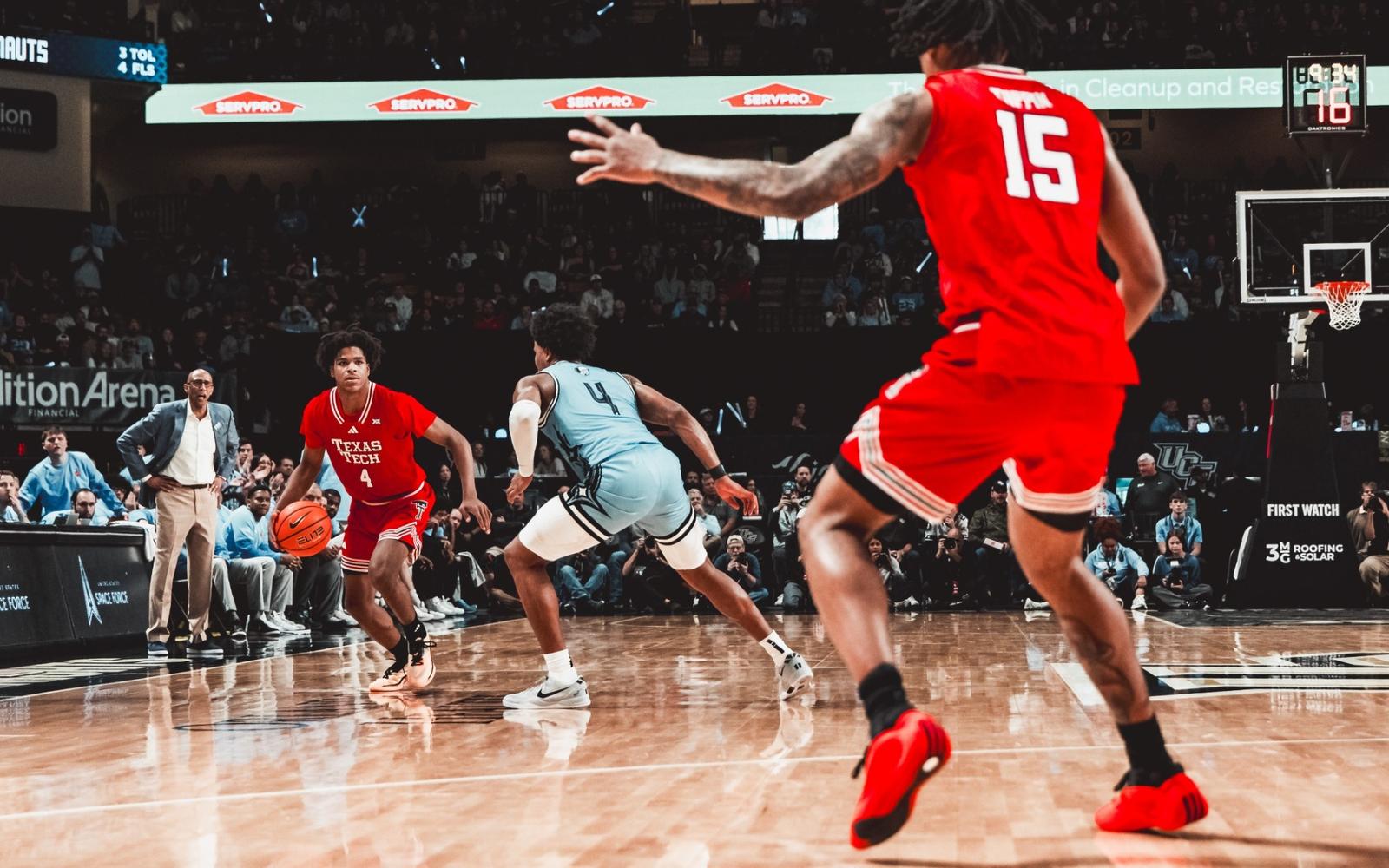 LeJuan Watts looks for room to work against the Iowa State defense.