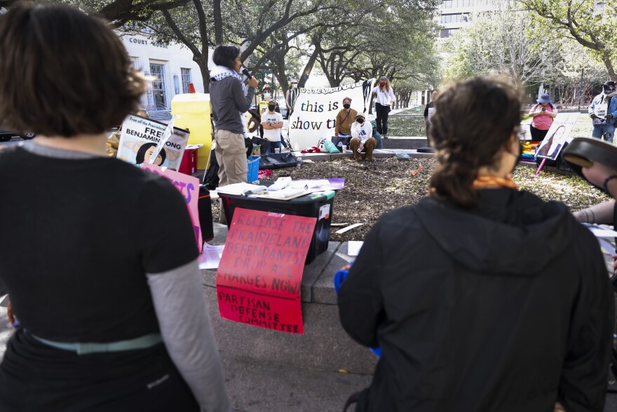 Supporters of the Prairieland ICE shooting defendants protest outside the federal courthouse Wednesday, March 11, 2026, in Fort Worth.