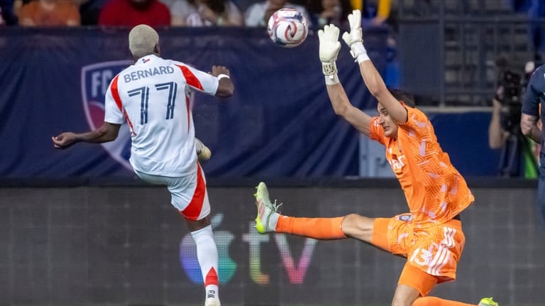 San Diego FC goal keeper Pablo Sisniega (13) blocks a...
