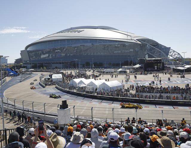 Drivers negotiate the horseshoe on ATT's parking lot at the intersection of Collins St. and Randol Mill Road during the inaugural Java House Grand Prix of Arlington in Arlington, Texas, Sunday, March, 15, 2026.