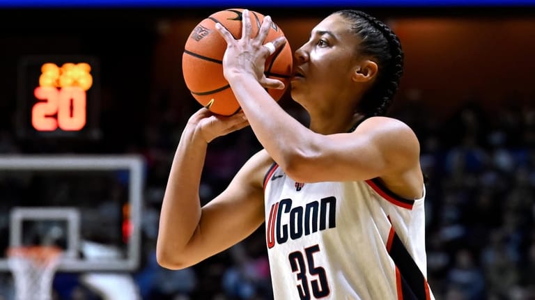 UConn guard Azzi Fudd (35) shoots during first half of...