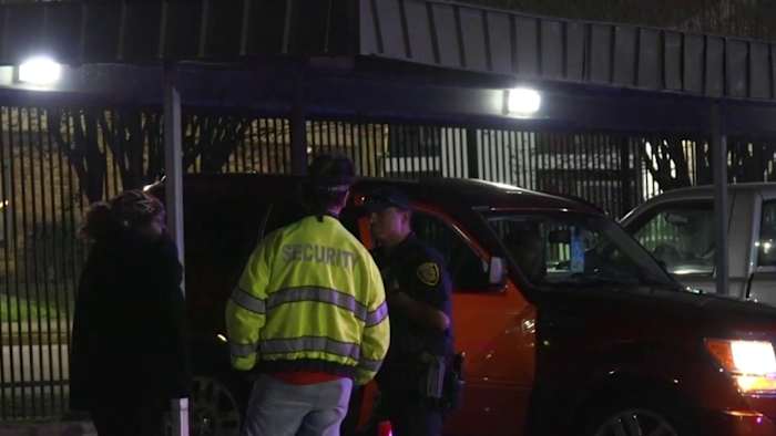 Attendant shot while working parking lot near NRG Park as Rodeo crowds fill area