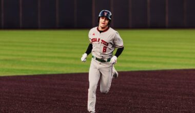 The Red Raider dugout erupts following Matt Quintanar's First Home Run as a Red Raider