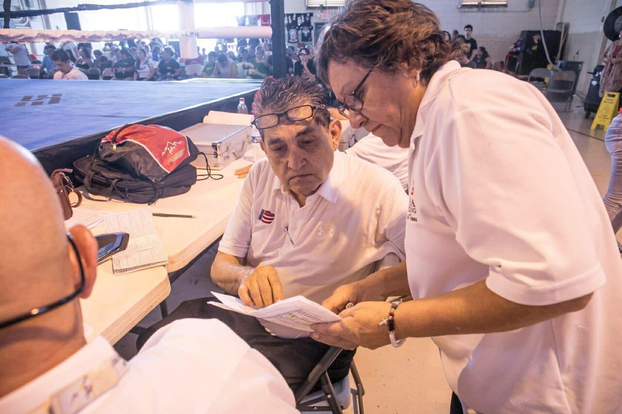 Rafael Davila judging boxing