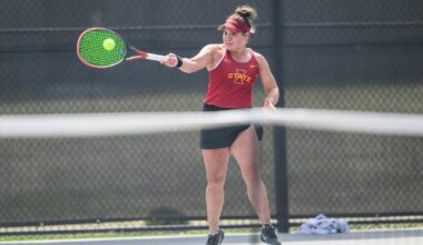 Alicia Dale takes a swing at practice.