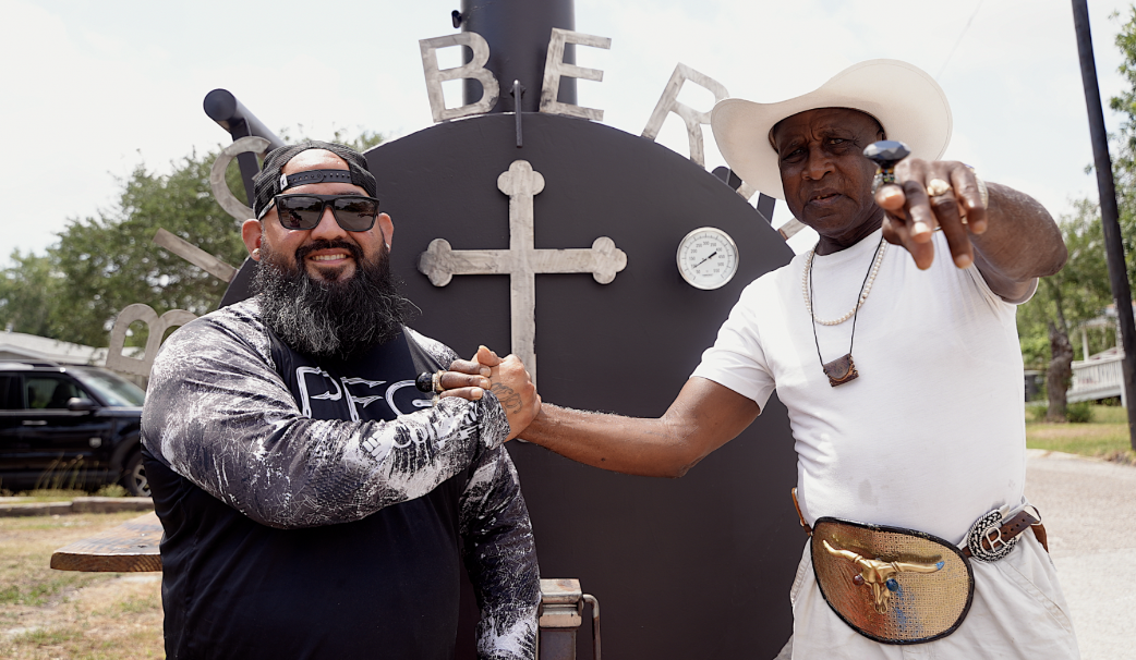 Pete Trevino helps Ronnie Mathis