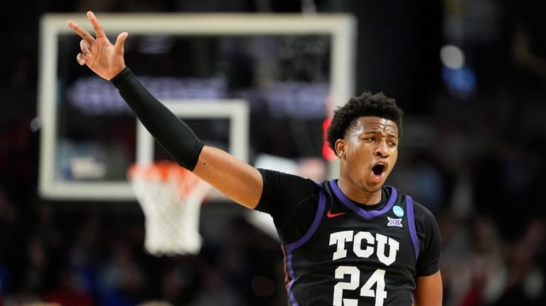TCU forward Xavier Edmonds celebrates after scoring against Ohio State...