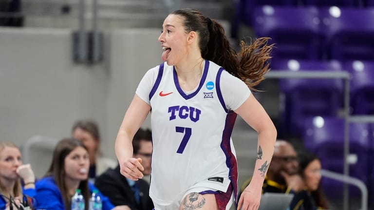 TCU forward Marta Suárez celebrates after sinking a three-pointer in...