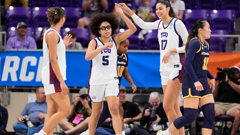 TCU's Donovyn Hunter, from left, Olivia Miles (5) and Clara...