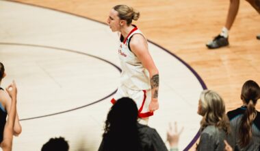 The Lady Raiders surround Bailey Maupin after her postgame TV interview, celebrating Texas Tech's opening round win of the NCAA Tournament over Villanova.