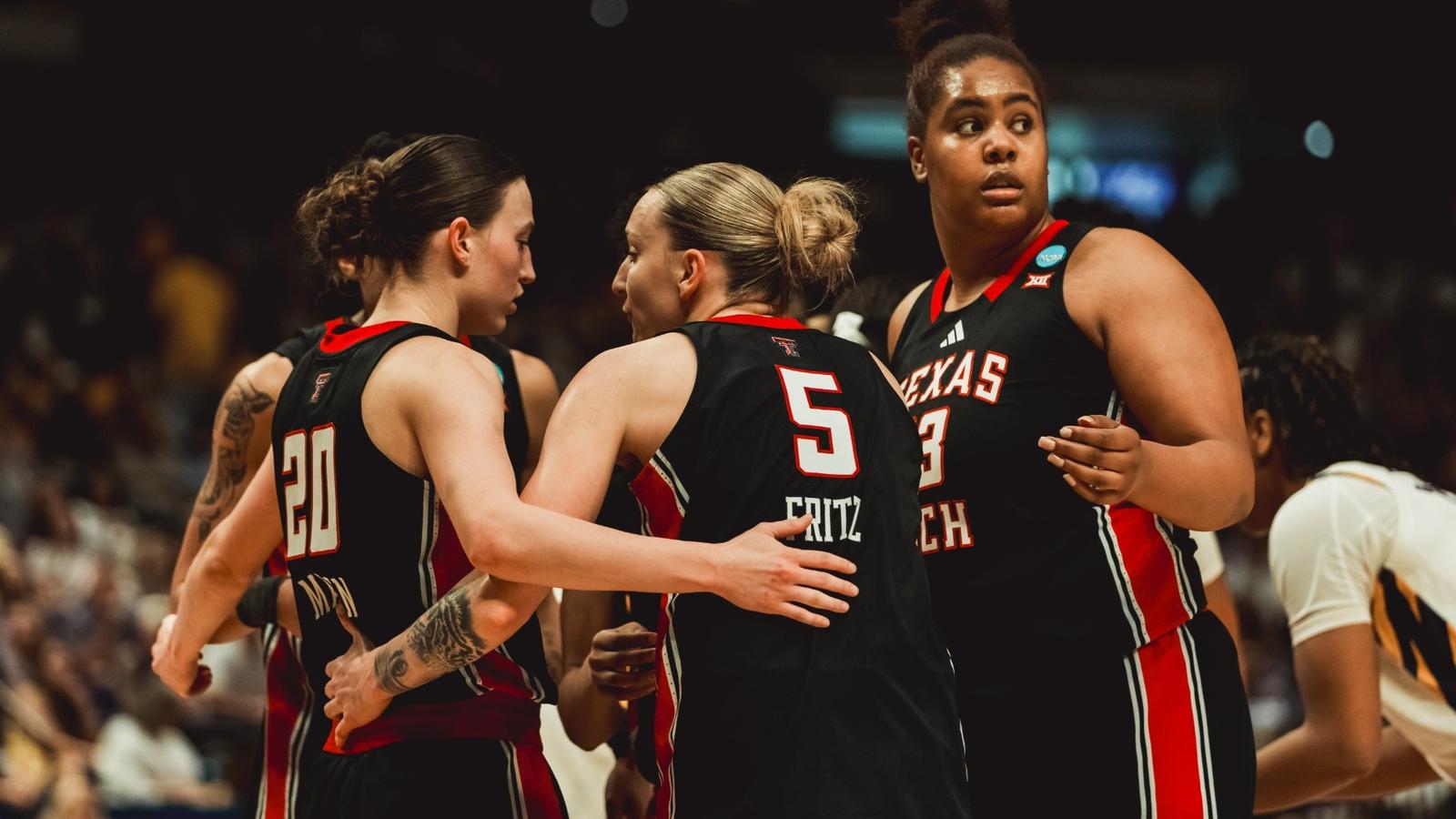 Denae Fritz celebrating after making a three.
