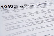 FILE - A 1040 tax form printed from the Internal Revenue Service web page is seen, Feb. 13,...