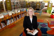 Dianne Walker, public service specialist at the Dallas Public Library Lochwood Branch, poses...