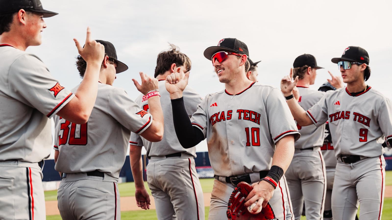 The Red Raiders celebrate their run-rule walk-off win Tuesday afternoon vs. New Mexico