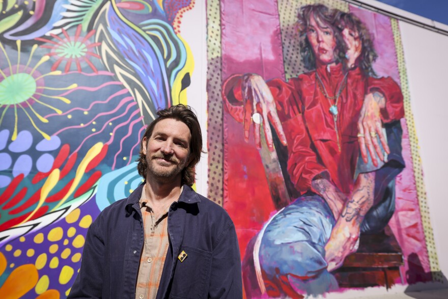 Jay Wilkinson is one of artists working on The Art Docks project Tuesday, March 24, 2026, in Dallas. The mural installation includes 18 murals in an industrial alleyway in the Design District.