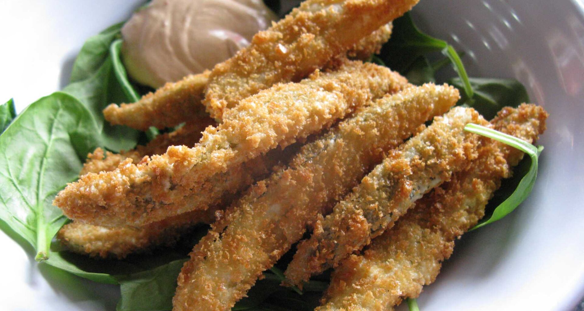 Fried pickles at Green Vegetarian Cuisine. The Southern-inspired vegetarian restaurant will close its doors permanently at the Alamo Quarry Market location in April 2026.
