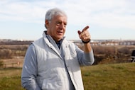 Real estate developer Fehmi Karahan points out different parts of the Fields development,...