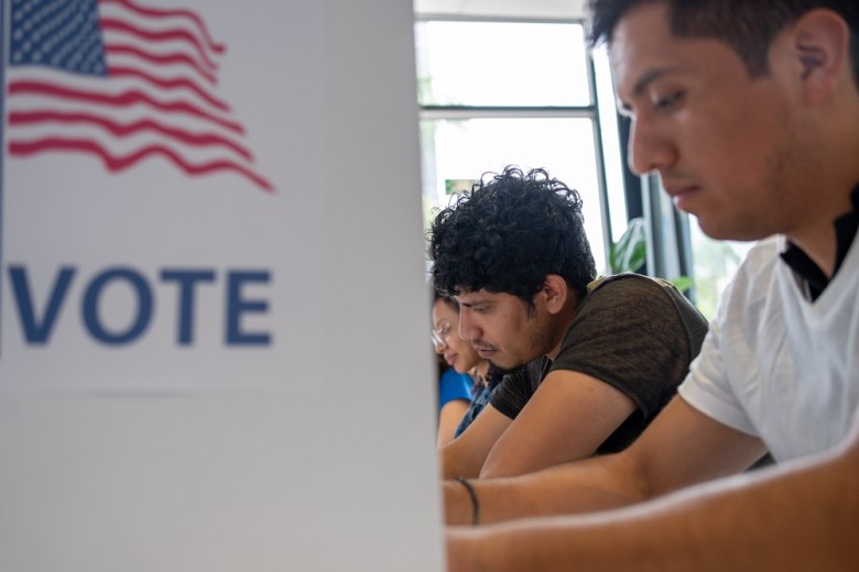 Latino voters cast ballots in a recent election.