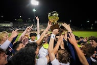 Frisco Wakeland players celebrate after a victory over Prosper Walnut Grove in a Class 5A...