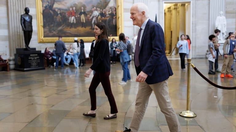 Sen. John Cornyn R-Texas walks through the Capitol Rotunda on...