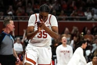 Texas Longhorns forward Madison Booker (35) celebrates a score and drawn foul during the...