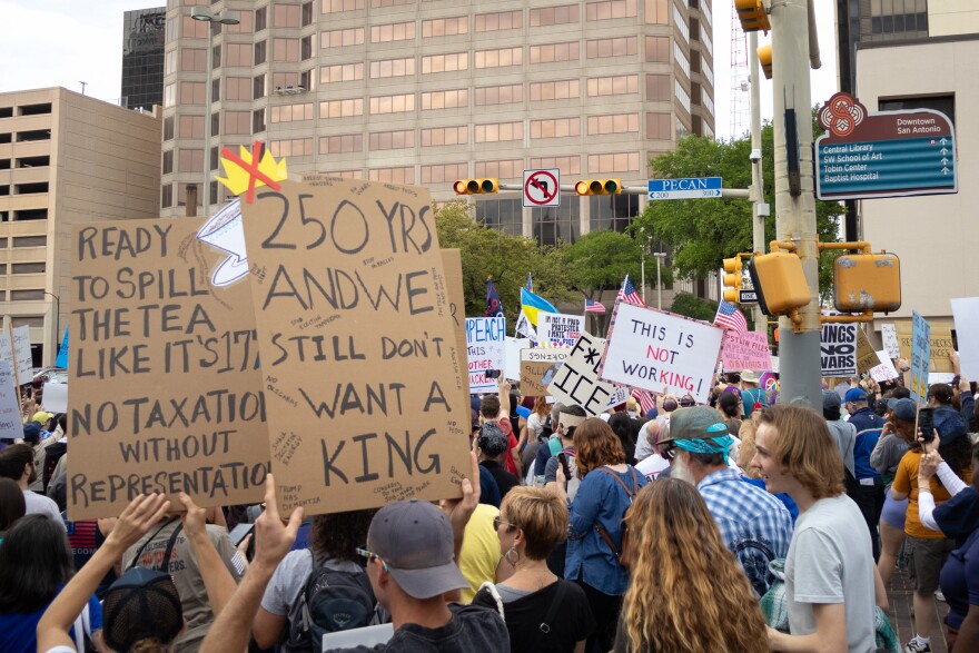 No Kings protesters gather at Pecan Street and Navarro Street to begin their march protesting against President Donald Trump and his administration on March 28, 2026