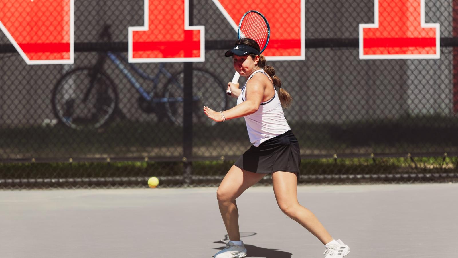 Yekaterina Dmitrichenko celebrating a match win.
