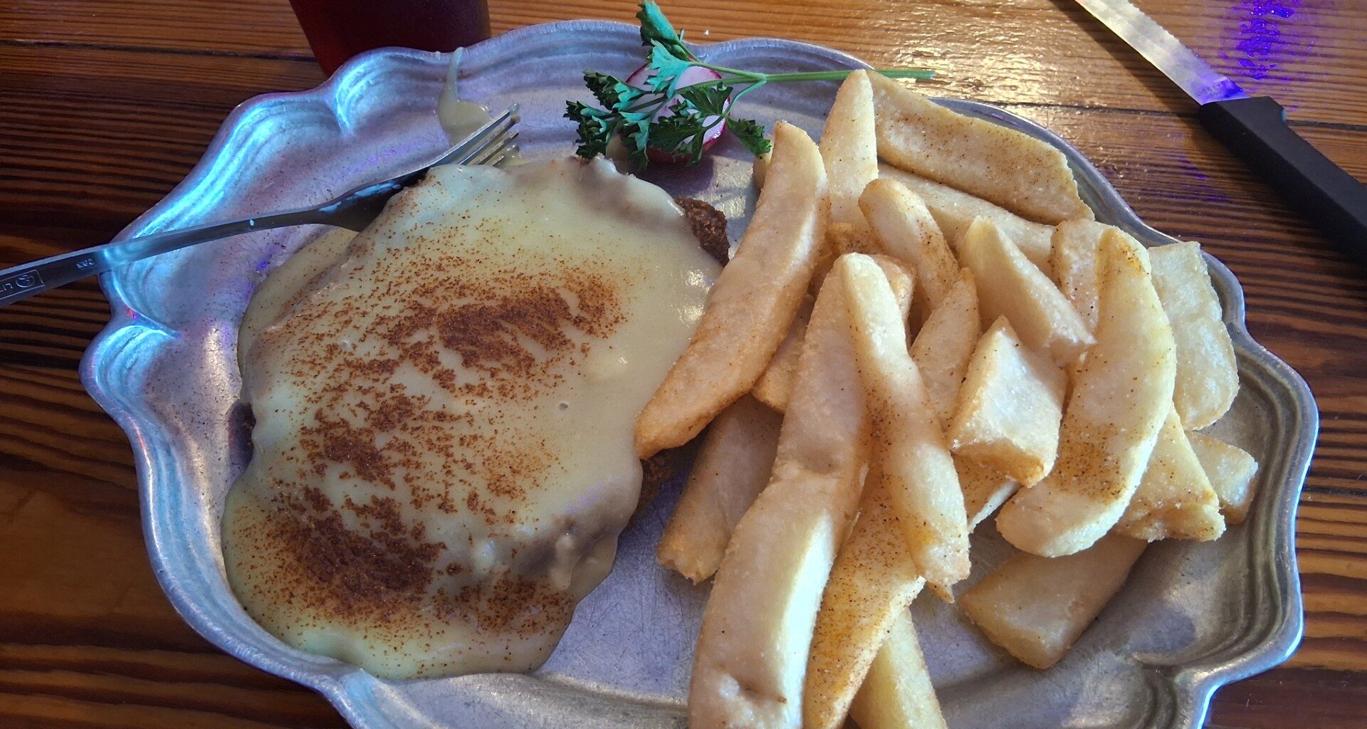 The chicken-fried steak plate at the Little Red Barn Steakhouse in San Antonio.