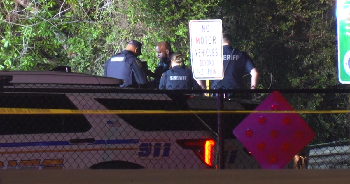 Driver fleeing police crashes into woods in north Harris County, killing two in fiery crash