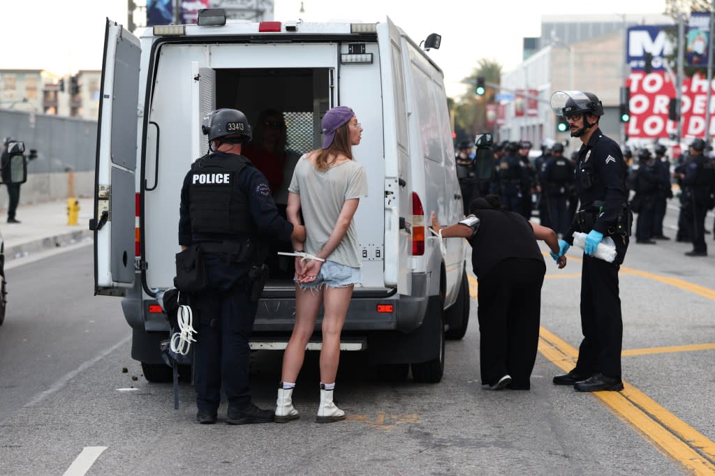 Protesters resisted arrests from LAPD cops. AP