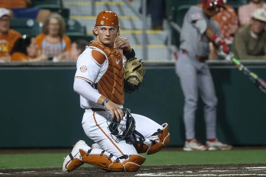 AUSTIN, TX – MARCH 26: Catcher Carson Tinney #8 of the Texas Longhorns adjusts his earpiece during the SEC college baseball game between Texas Longhorns and Oklahoma Sooners on March 26, 2026, at UFCU Disch-Falk Field in Austin, TX. (Photo by David Buono/Icon Sportswire via Getty Images)